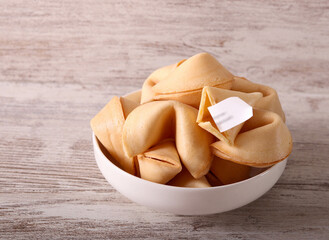 Fortune cookies, over wooden table