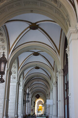 Elegant historical archway with ornate ceiling