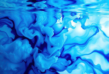 Vibrantes nubes de tinta azul y blanca se arremolinan bajo el agua, creando un fascinante movimiento fluido abstracto con reflejos de luz etéreos
