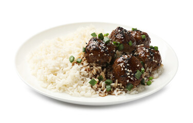 Delicious rice with meatballs, sauce and green onions isolated on white