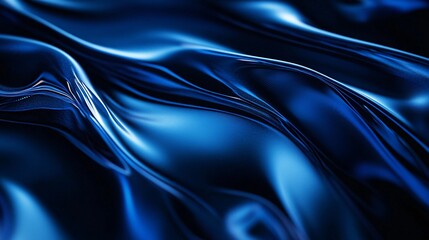 Fototapeta premium A close-up of smooth, flowing blue fabric with reflective surfaces, creating a sense of depth and movement.