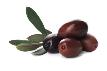 Delicious marinated black olives and leaves isolated on white