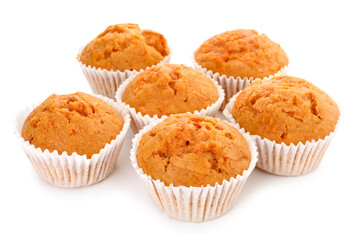 Tasty sweet carrot muffins isolated on white