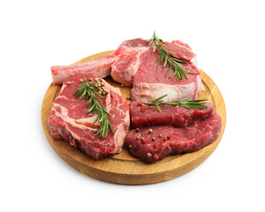 Pieces of raw beef meat and spices isolated on white