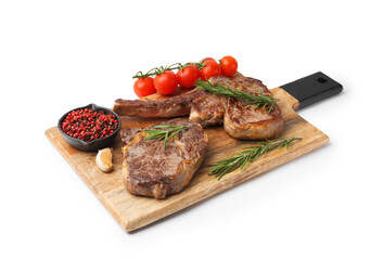 Pieces of delicious beef meat, spices and tomatoes isolated on white