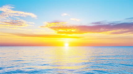 Obraz premium The sun setting over a tranquil beach with gentle waves lapping at the shore. The soft pastel colors in the sky reflect a peaceful, serene moment in nature.