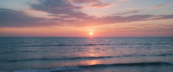 Obraz premium Serene Sunset Over Ocean Waves with Soft Colors and Open Space for Inspirational Text or Quotes
