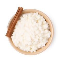 Tasty rice pudding with cinnamon isolated on white, top view