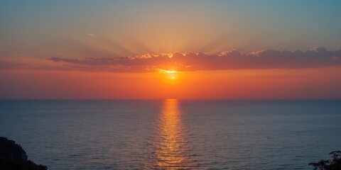 Obraz premium Stunning Sunset Over Tranquil Ocean With Clear Skies And Reflective Water Perfect For Text Overlay