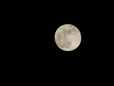 full moon over black sky