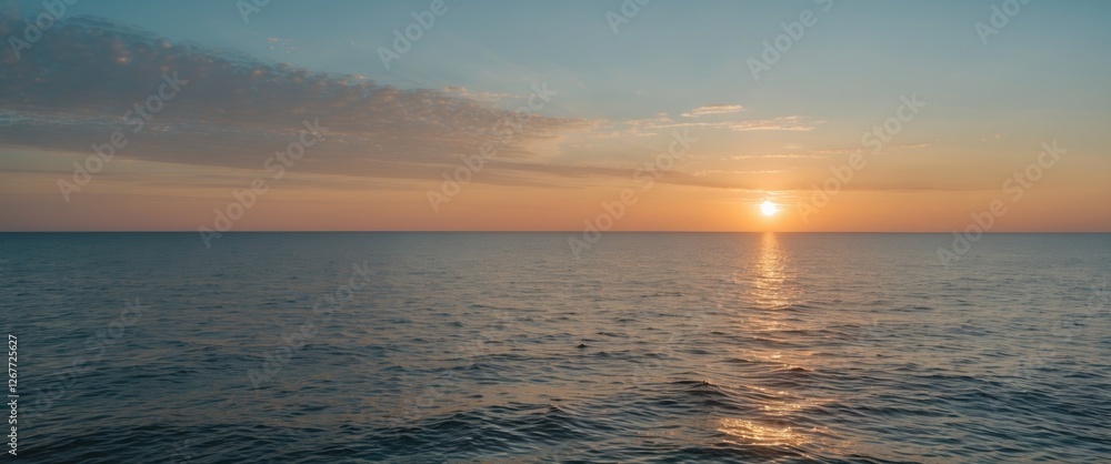 Aufkleber sunset over calm ocean water with colorful sky and soft clouds reflecting on the surface copy space