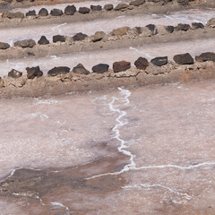 Gran Canaria, salt evaporation ponds Salinas el Bufadero around a blowhole Bufadero in the coast of Arucas municipality