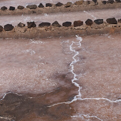Gran Canaria, salt evaporation ponds Salinas el Bufadero around a blowhole Bufadero in the coast of Arucas municipality