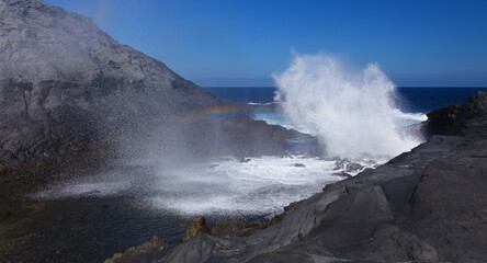 Gran Canaria, salt evaporation ponds Salinas el Bufadero around a blowhole Bufadero in the coast of Arucas municipality