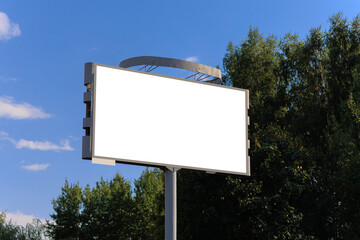 White billboard along the highway. Background for design and advertising. 