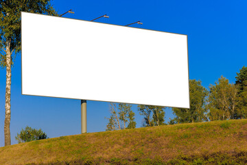 Large white billboards for outdoor advertising and information boards along the roads and on the streets of the city. Background for design and advertising.