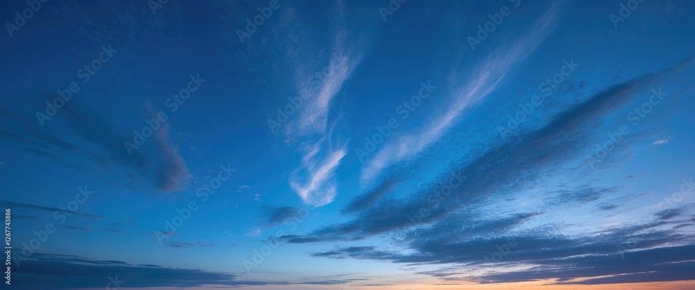 Aufkleber blue sky with soft clouds during sunset illuminated by warm colors and gradient of light with ample 