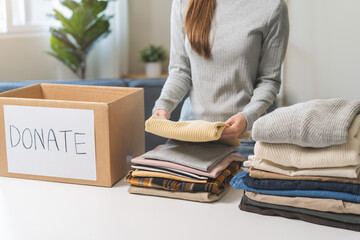 Recycling, Donation for poor, asian young woman, girl sitting pack object at home, putting on stuff...