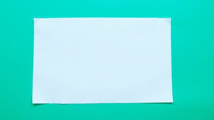 Blank White Paper on Teal Background - Mockup for Text or Design