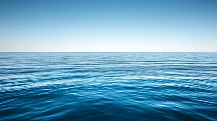 Fototapeta premium Serene Ocean Water Under a Clear Blue Sky