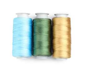Spools of bright sewing threads isolated on white, top view