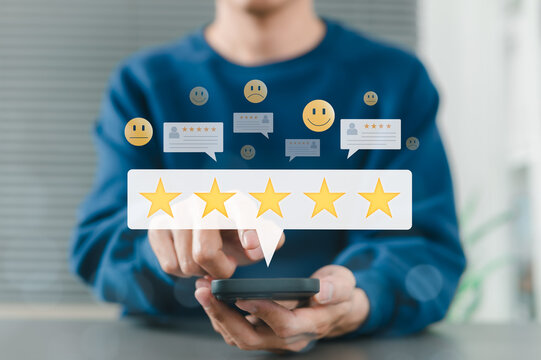 Customer review satisfaction feedback concept. Man using smartphone give five star rating, with review icons, emoticons, speech bubbles, online customer feedback, satisfaction, and user experience. - Powered by Adobe