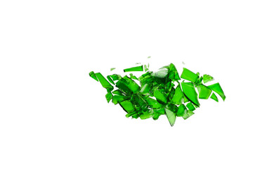 Sharp and jagged pieces of broken green glass cut out on a white background, symbolizing fragility and caution.