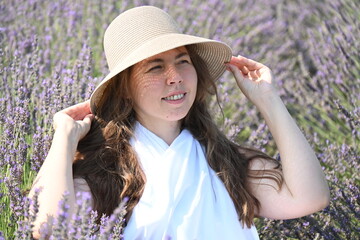 girl in white dress on lavender field,