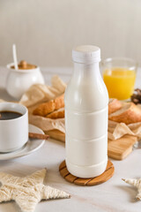 plastic bottle mockup with cap on a white table