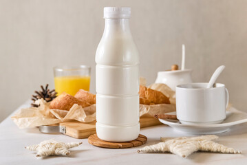 plastic bottle mockup with cap on a white table