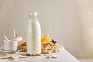 plastic bottle mockup with cap on a white table