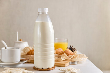 plastic bottle mockup with cap on a white table