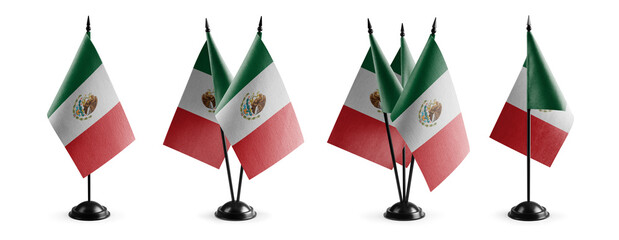 Small national flags of the Mexico on a white background