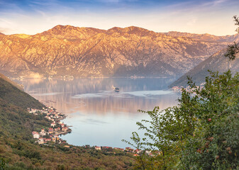 Sunset illuminating the bay of Kotor in Montenegro with Our lady of the rocks island