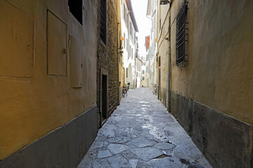 A narrow street in the old town of Florence where there is no traffic now