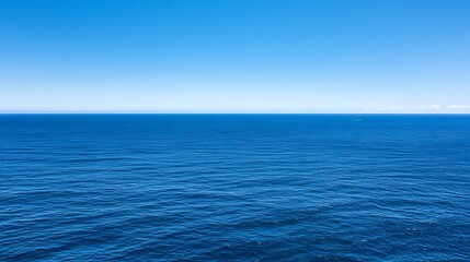 Obraz premium Serene Ocean Meets Azure Sky A Tranquil Seascape