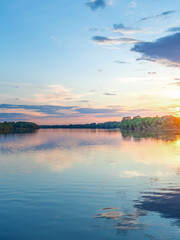 Calm lake with a beautiful sunset in the background