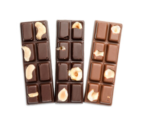 Tasty chocolate bars with nuts isolated on white, top view