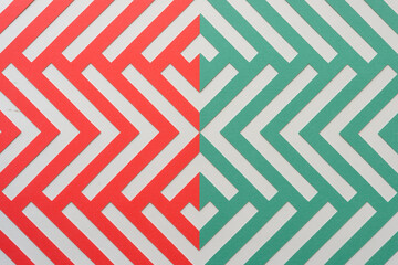 machine-cut chevron pattern in red and green on blank paper