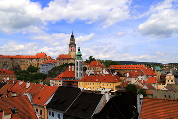 Fototapeta premium Czech Republic, town of Cesky Krumlov. Old tower, historical houses with tiled roofs, gothic buildings, architecture. Panorama of Cesky Krumlov.