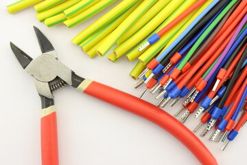 Electrical tools for assembling an electrical switchboard. 