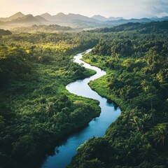 Fototapeta premium Serene Tropical River Flowing Through Lush Green Forest Under Gentle Sunlight and Hazy Mountains