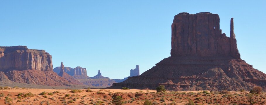 Majestic sandstone formations and scenic beauty of Monument Valley, a Navajo Nation Park spanning across Utah and Arizona is world famous. 