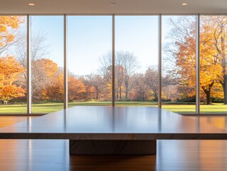 Fototapeta premium conference table with a view of autumn trees.