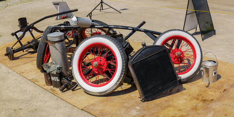 Great, closeup detailed view of a pileup of old various vehicles, trucks and cars parts