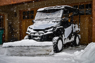 Fresh snow on a snow plow during a blizzard on a snowy day in the winter in Durango, Colorado, United States