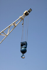 Fototapeta premium crane hook on blue sky background