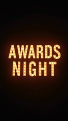 A glowing "Awards Night" sign in classic font with bright marquee lights, set against a black background, evoking a retro cinema theme with dramatic lighting.
