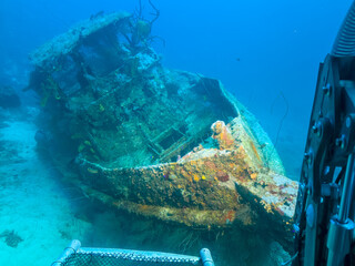 Sunken ship covered by coral