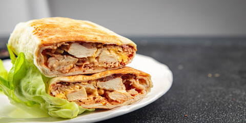 kebab chicken meat donner kebab shawarma sandwich tortilla meat filling fast food flatbread fresh tasty food dish gourmet food background on the table rustic food top view copy space